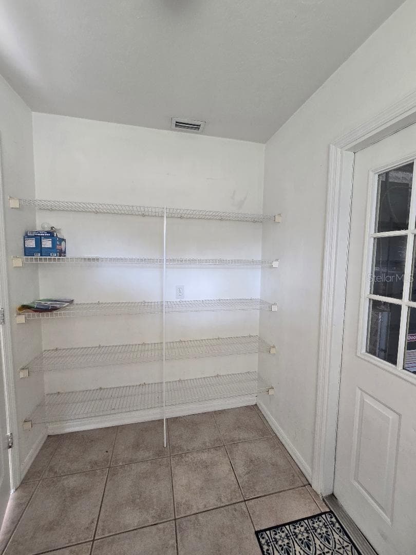 Laundry room pantry style shelving - 13607 NW 135 DR, ALACHUA
