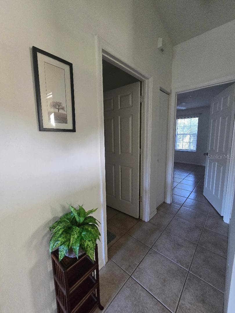 Hall to guest bathroom & bedroom2 - 13607 NW 135 DR, ALACHUA