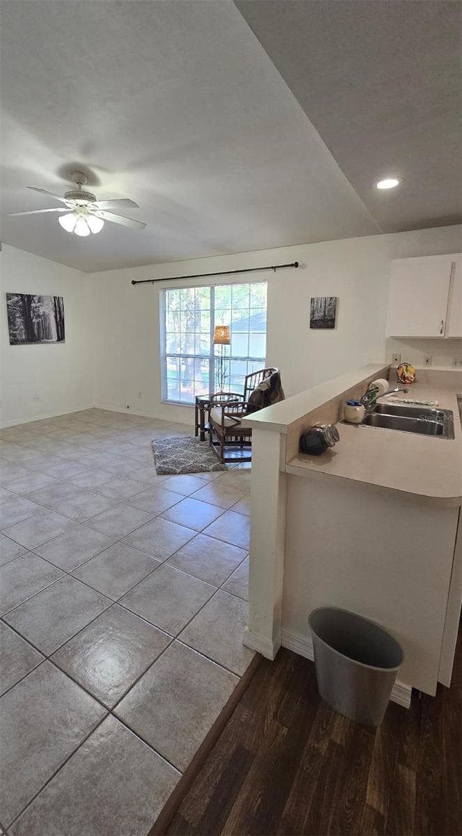 View from owners suite to kitchen and living room - 13607 NW 135 DR, ALACHUA