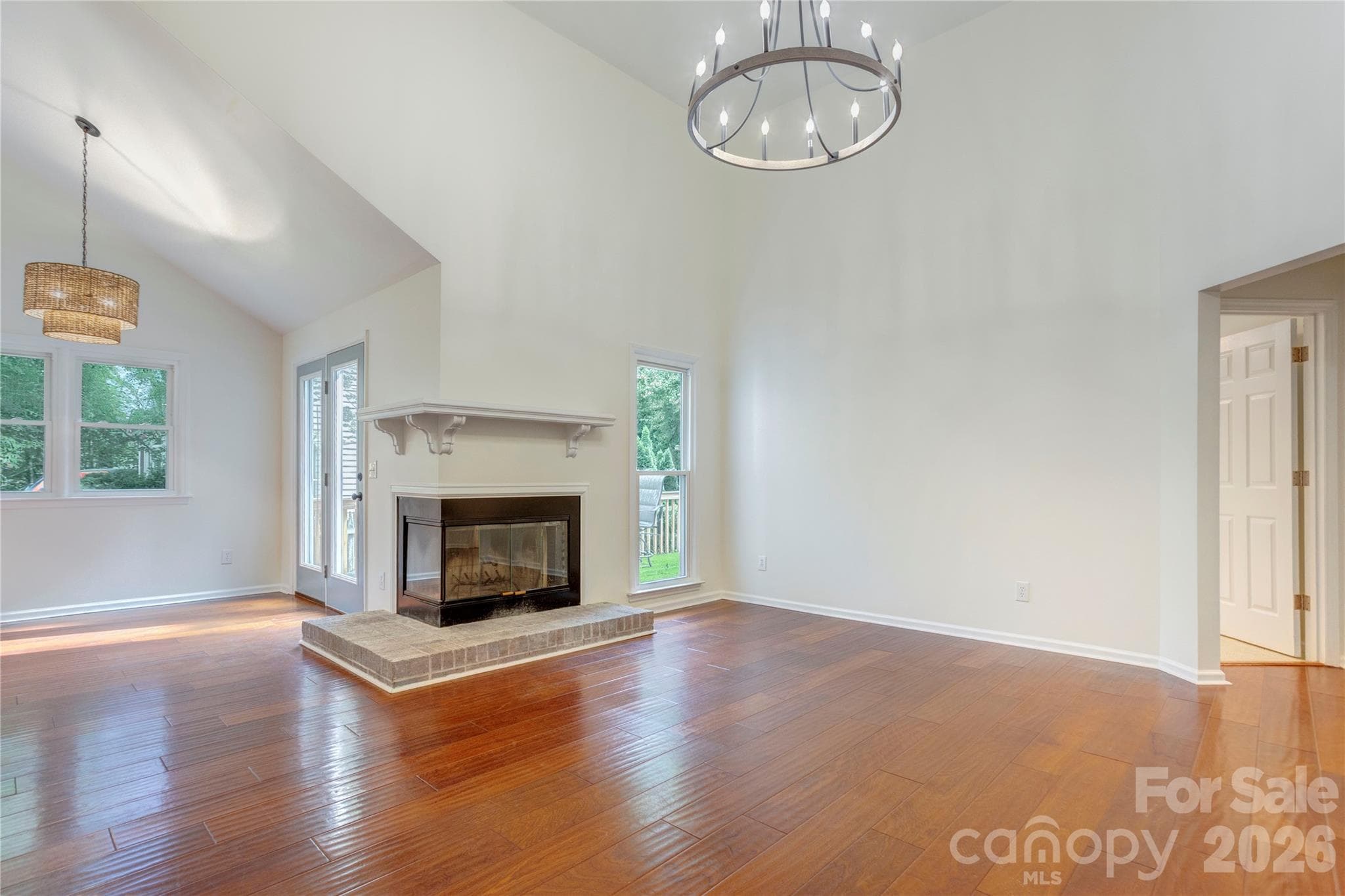 Spacious living area with updated lighting - 156 Edgewater Drive NW, Concord