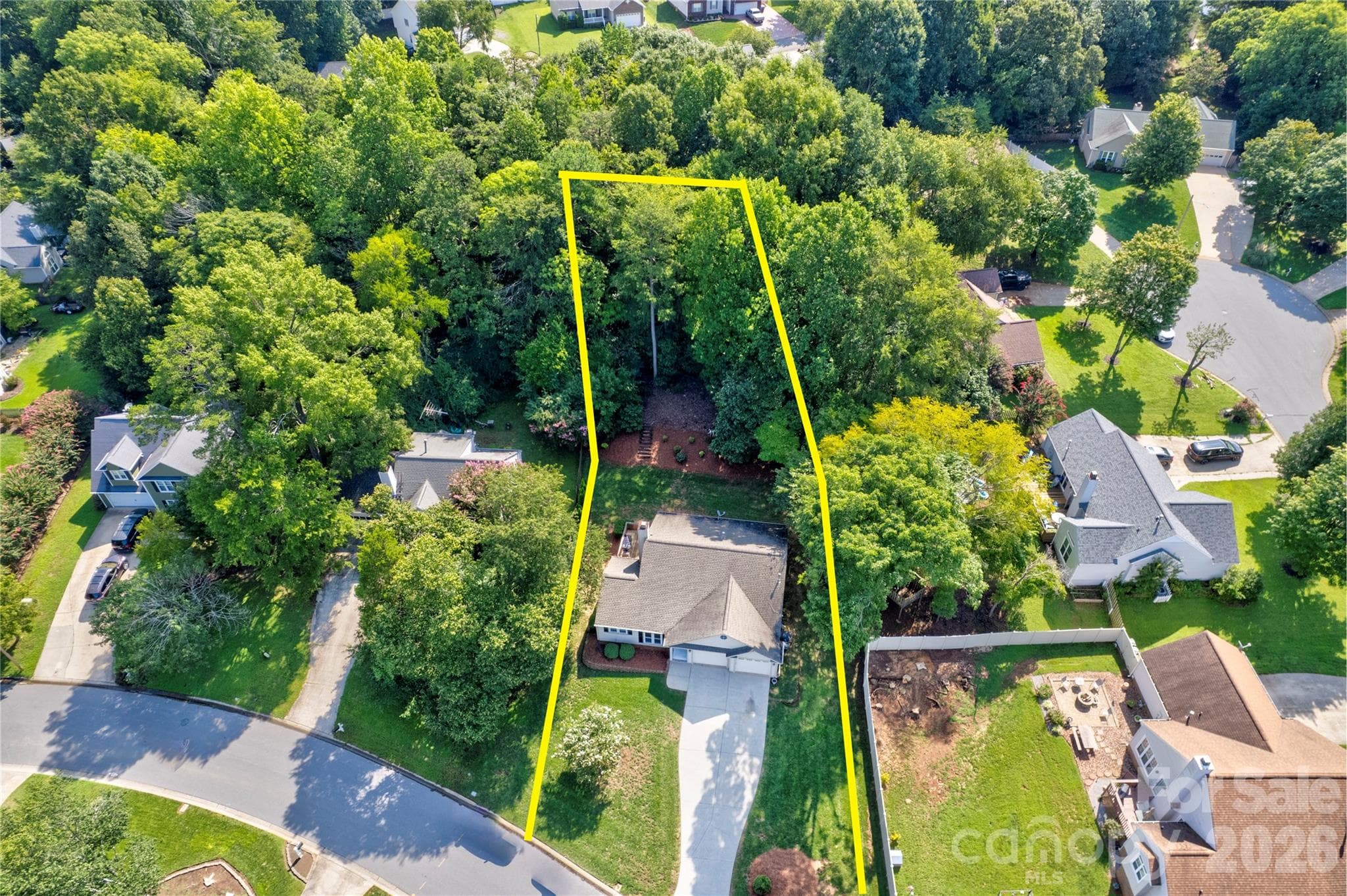 The lot over a half acre with wooded area in the back - 156 Edgewater Drive NW, Concord