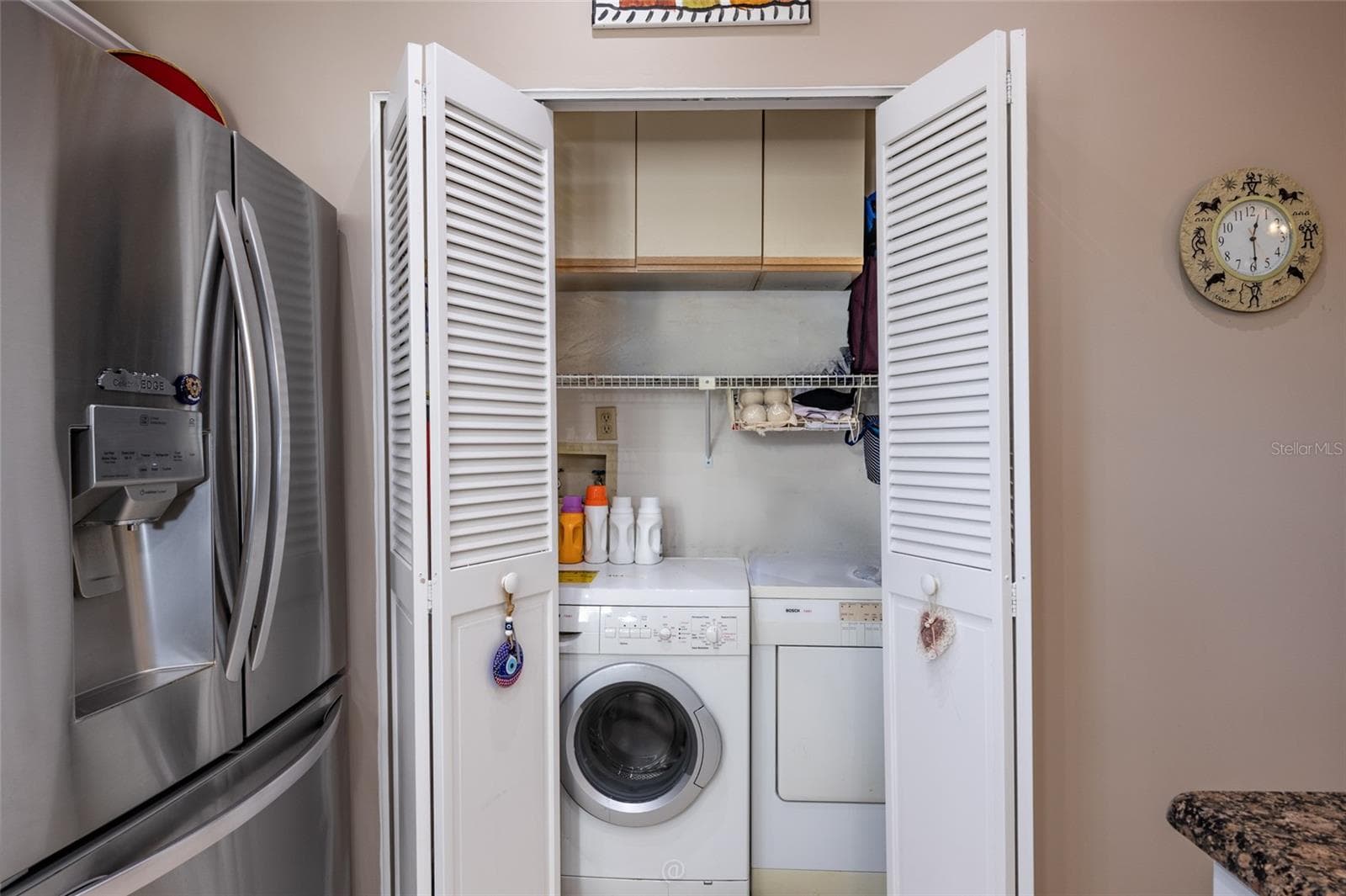 Laundry closet - 11 MAGNOLIA DR S #11, ORMOND BEACH