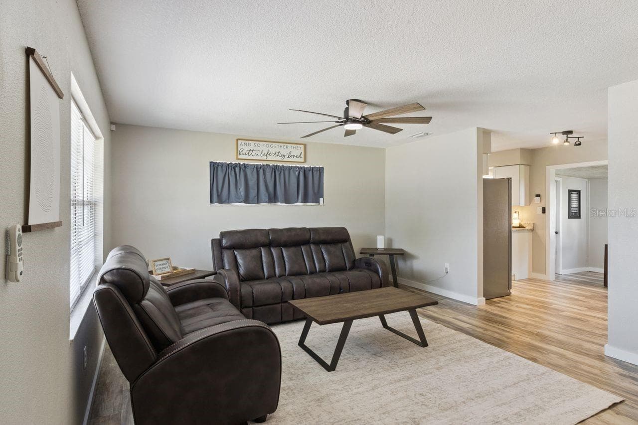 Living room opens into Kitchen & Dining - 220 ALDO DR, BABSON PARK