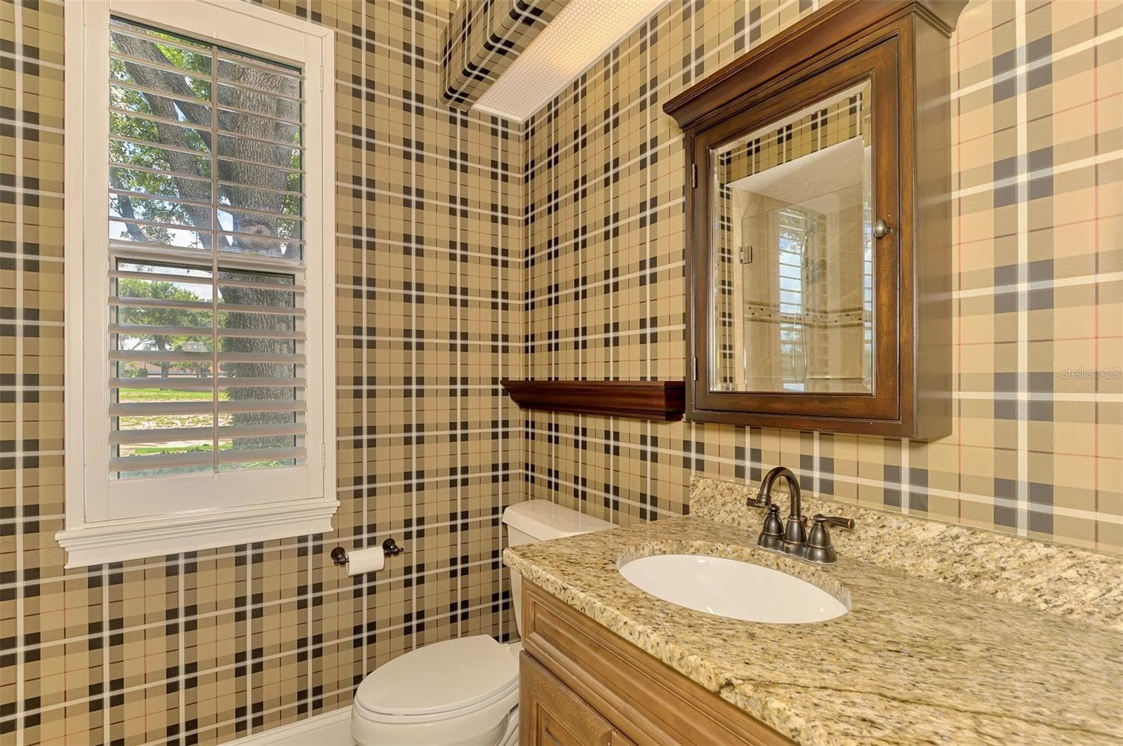 Guest and pool bathroom - 7767 ALISTER MACKENZIE DR, SARASOTA