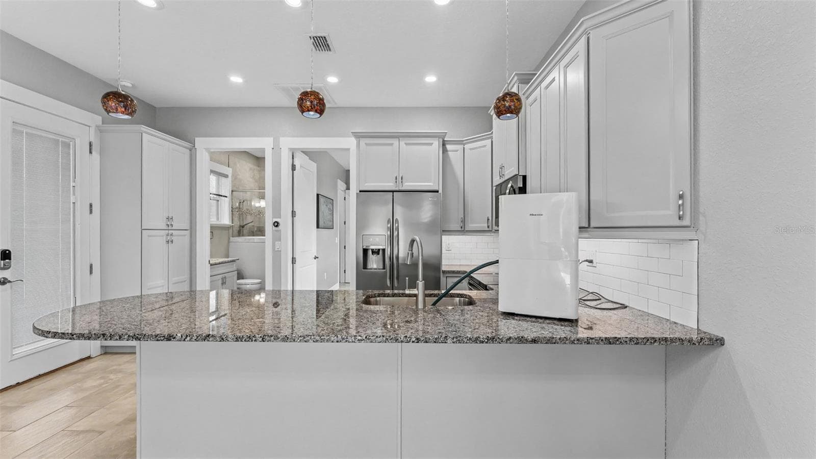 custom kitchen - 3220 FISH HAWK DR, POLK CITY