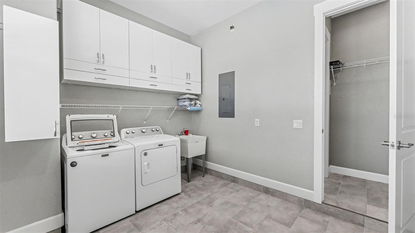 Laundry/ storage area - 3220 FISH HAWK DR, POLK CITY