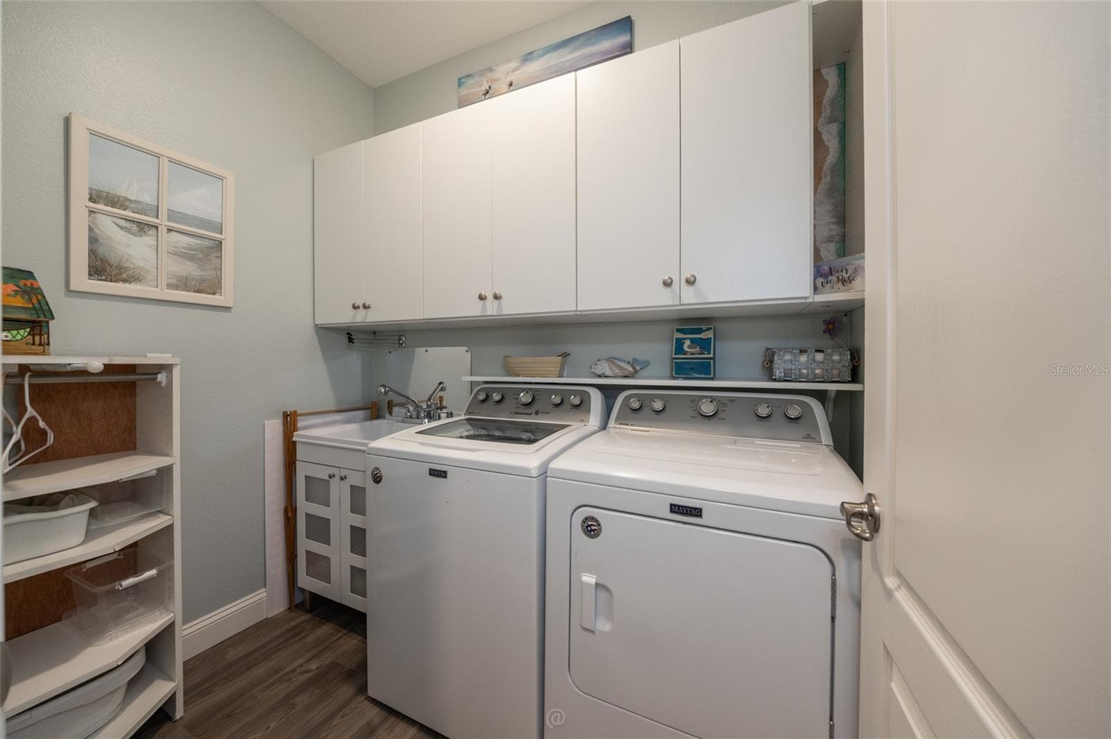 Laundry room w/ storage - 17 WHITE HAVEN LN, PALM COAST