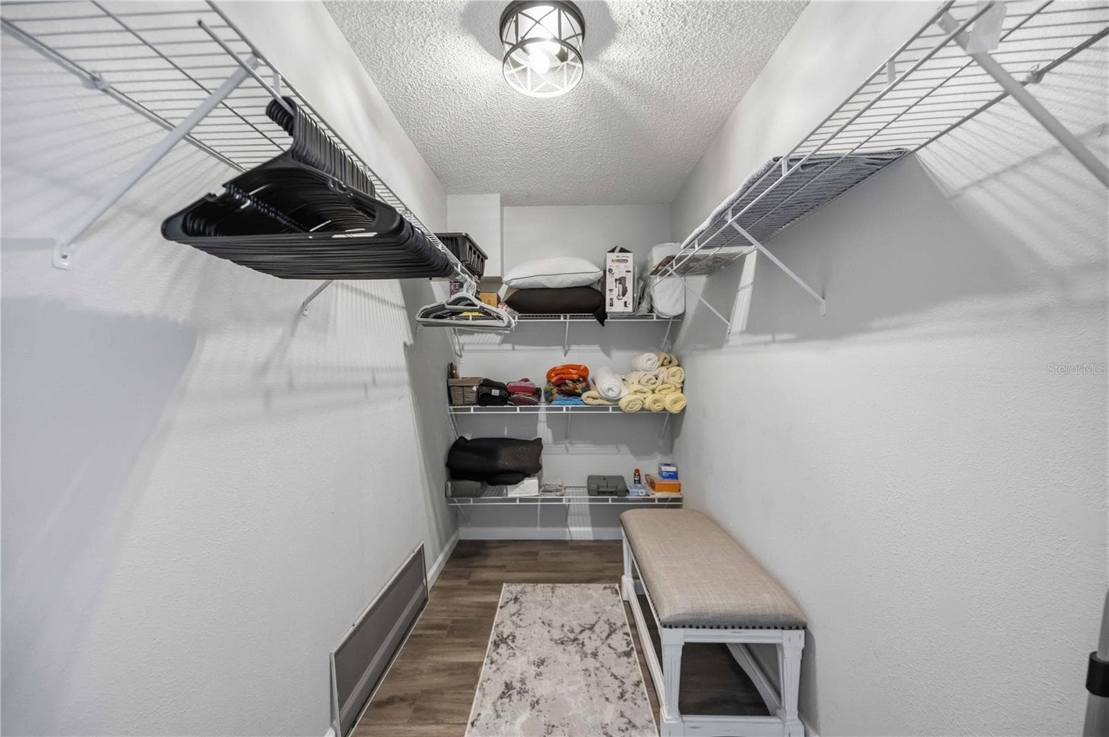 Primary bedroom walk-in closet - 406 CERROMAR CIR N #328, VENICE