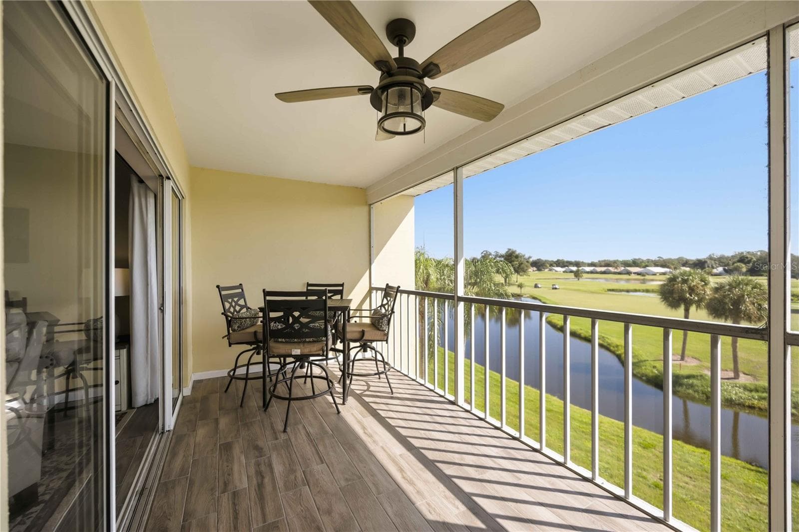 Relax outdoors while taking in sweeping views across the water and beautifully maintained fairways. - 406 CERROMAR CIR N #328, VENICE