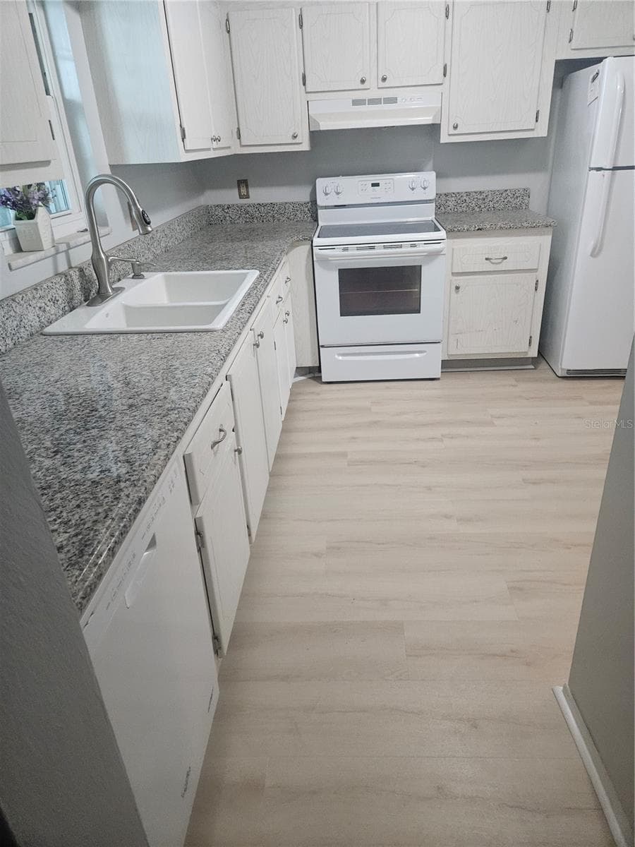 Condominium at 1706 BELLEAIR FOREST DR #310, BELLEAIR, photo 2 of 14