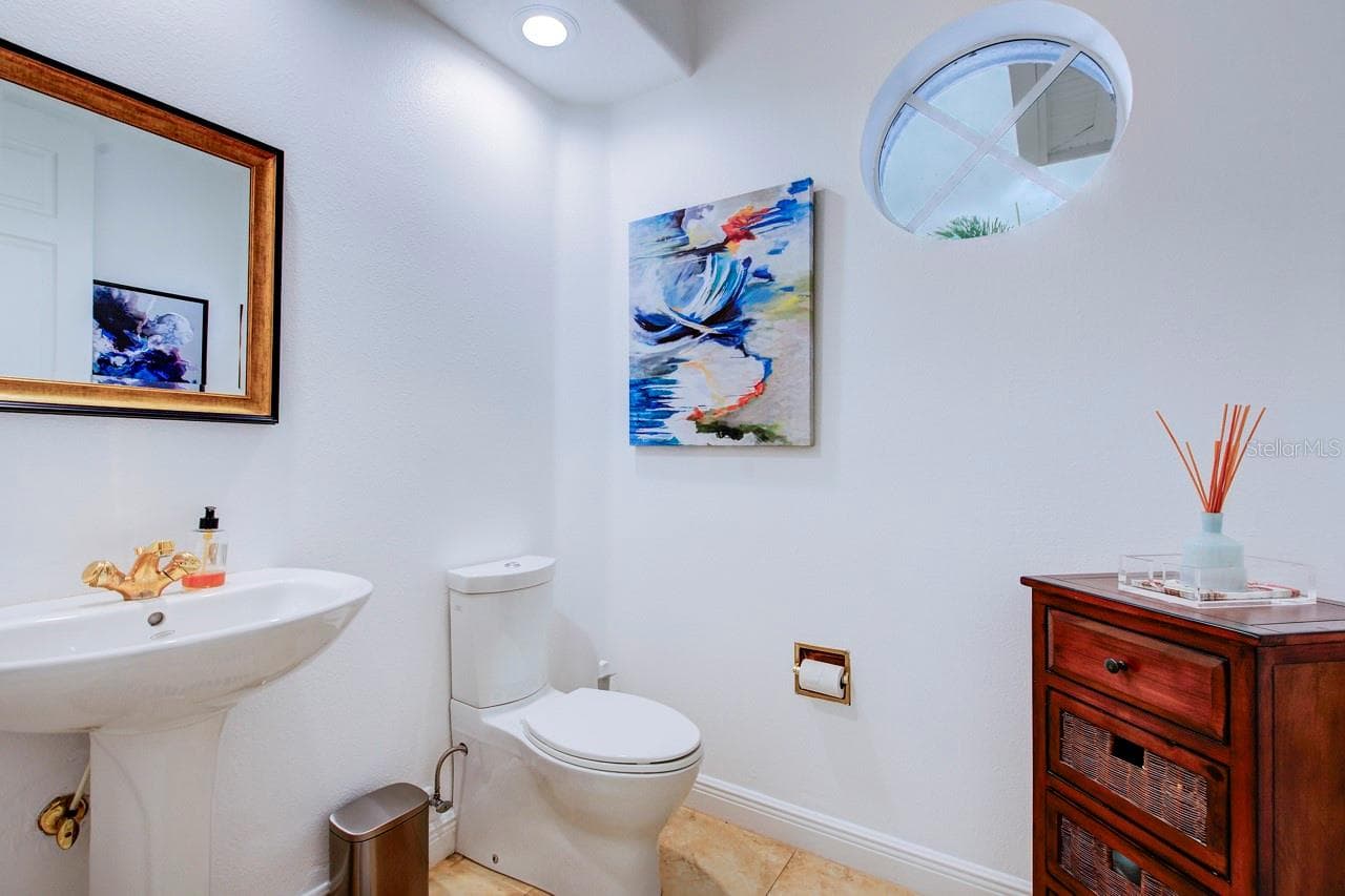 Half bath on main level - 6113 PASADENA POINT BLVD, GULFPORT
