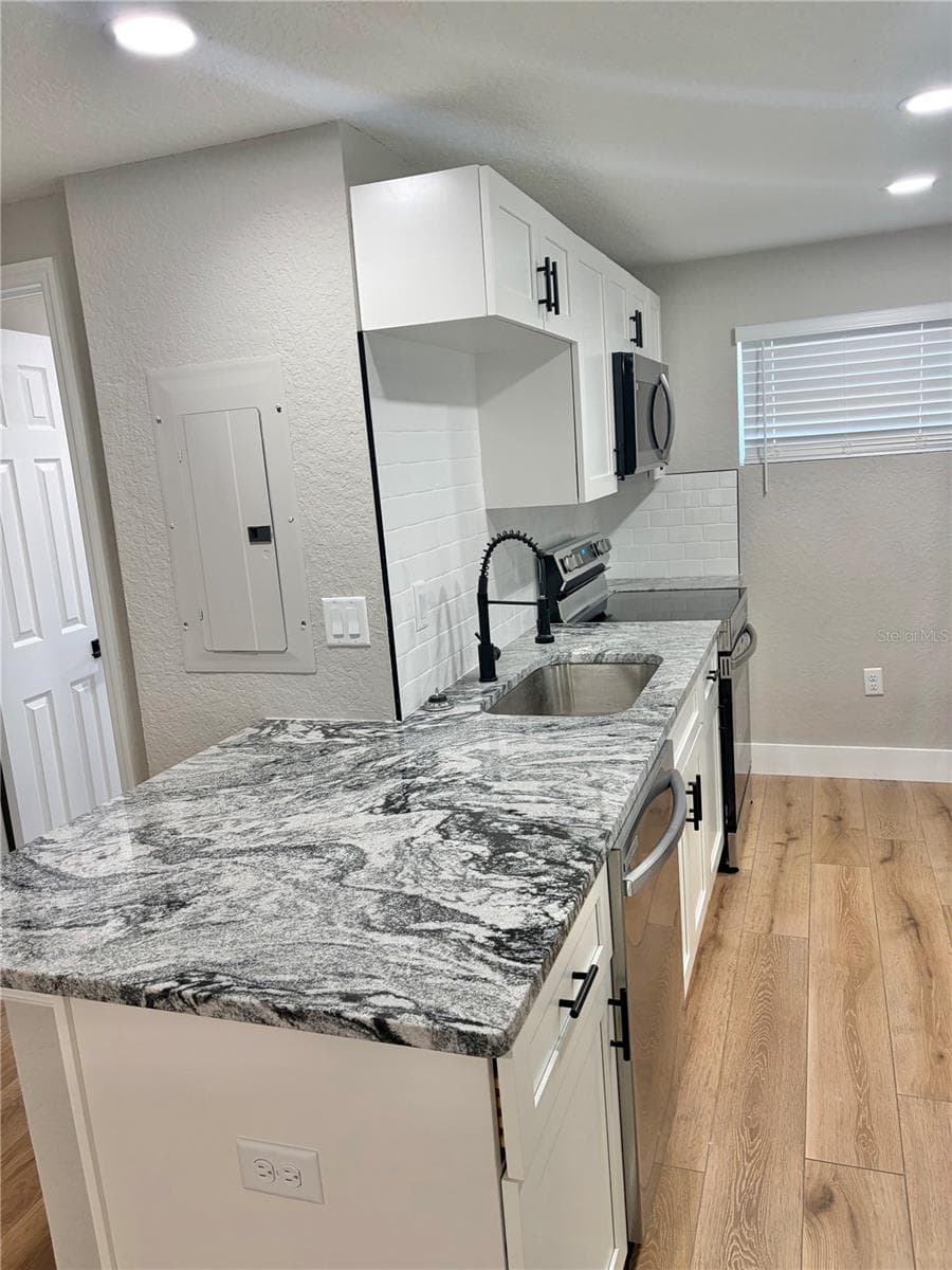 Single Family Residence at 12119 VICTORY DR, HUDSON, photo 18 of 62