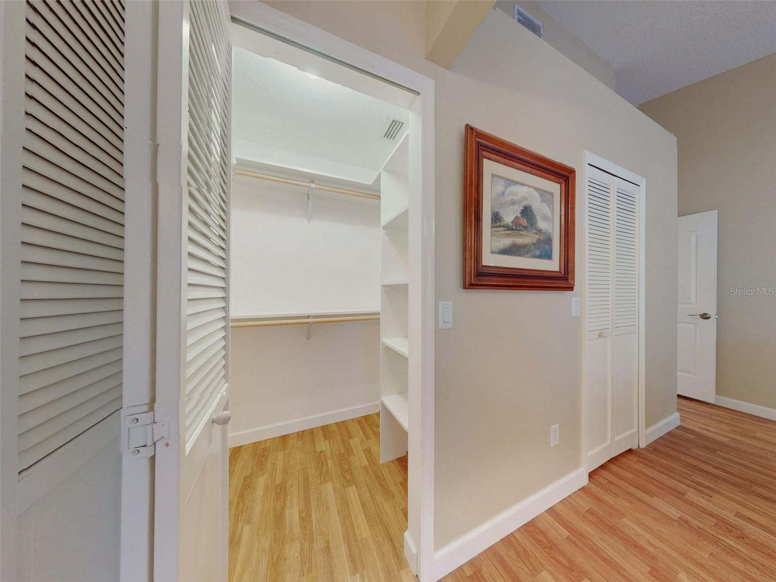 Primary walk-in closets - 1122 STILLWATER DR, DELAND