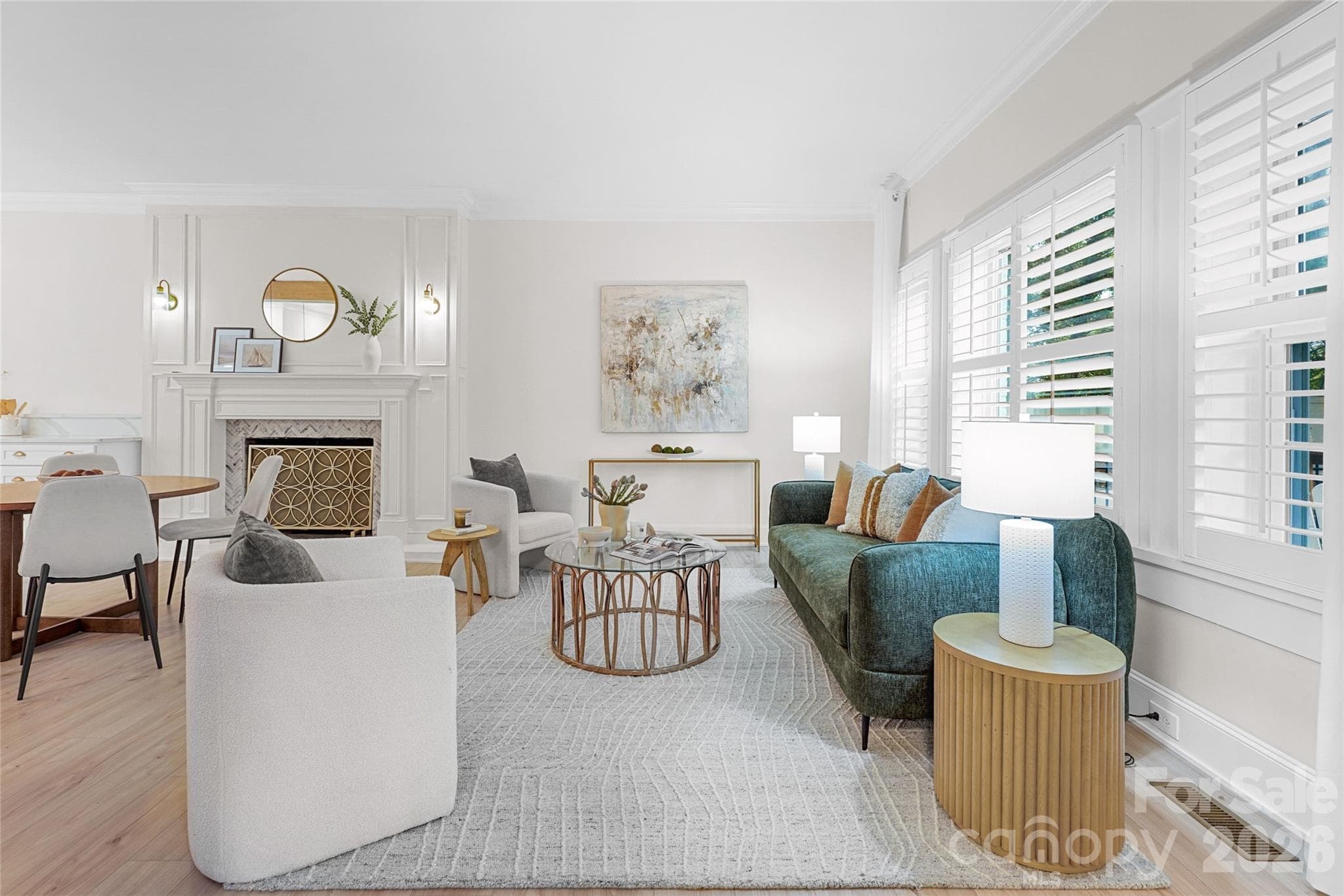 Spacious living room flows naturally into the kitchen. - Charlotte