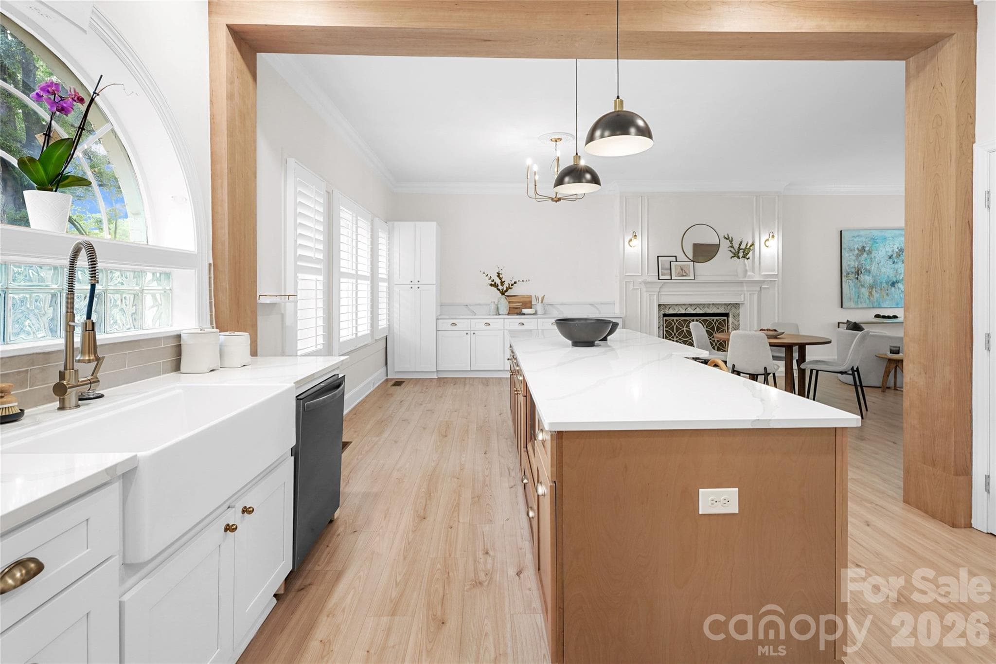 Generous counter space and cabinetry make this kitchen as functional as it is beautiful. - Charlotte