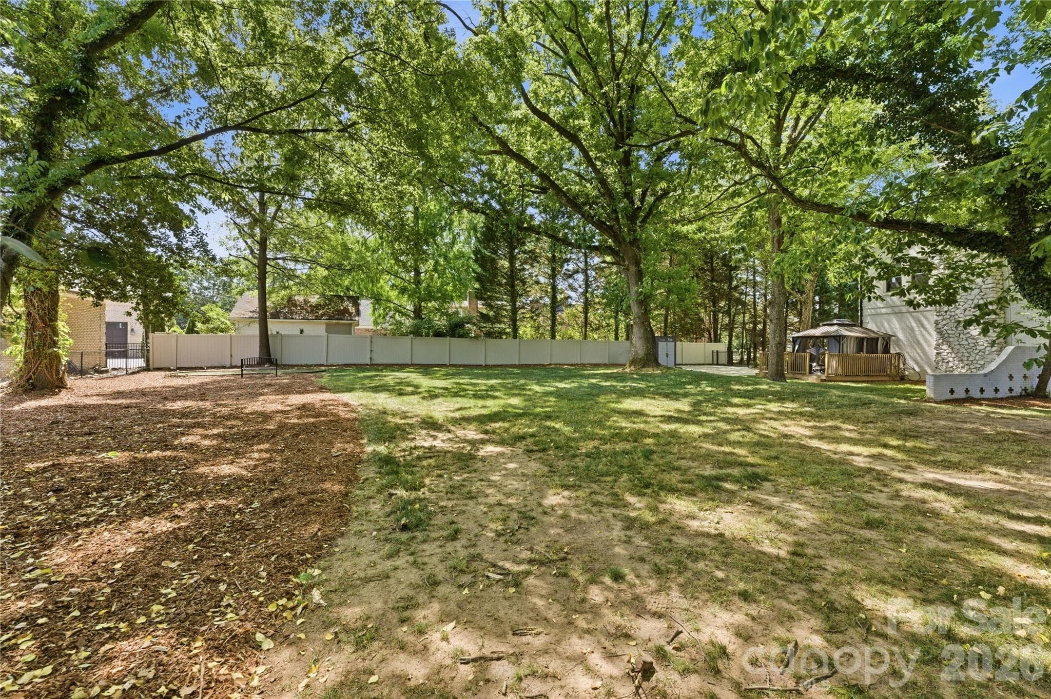 Plenty of lawn for entertaining, play—and even a future pool! - Charlotte