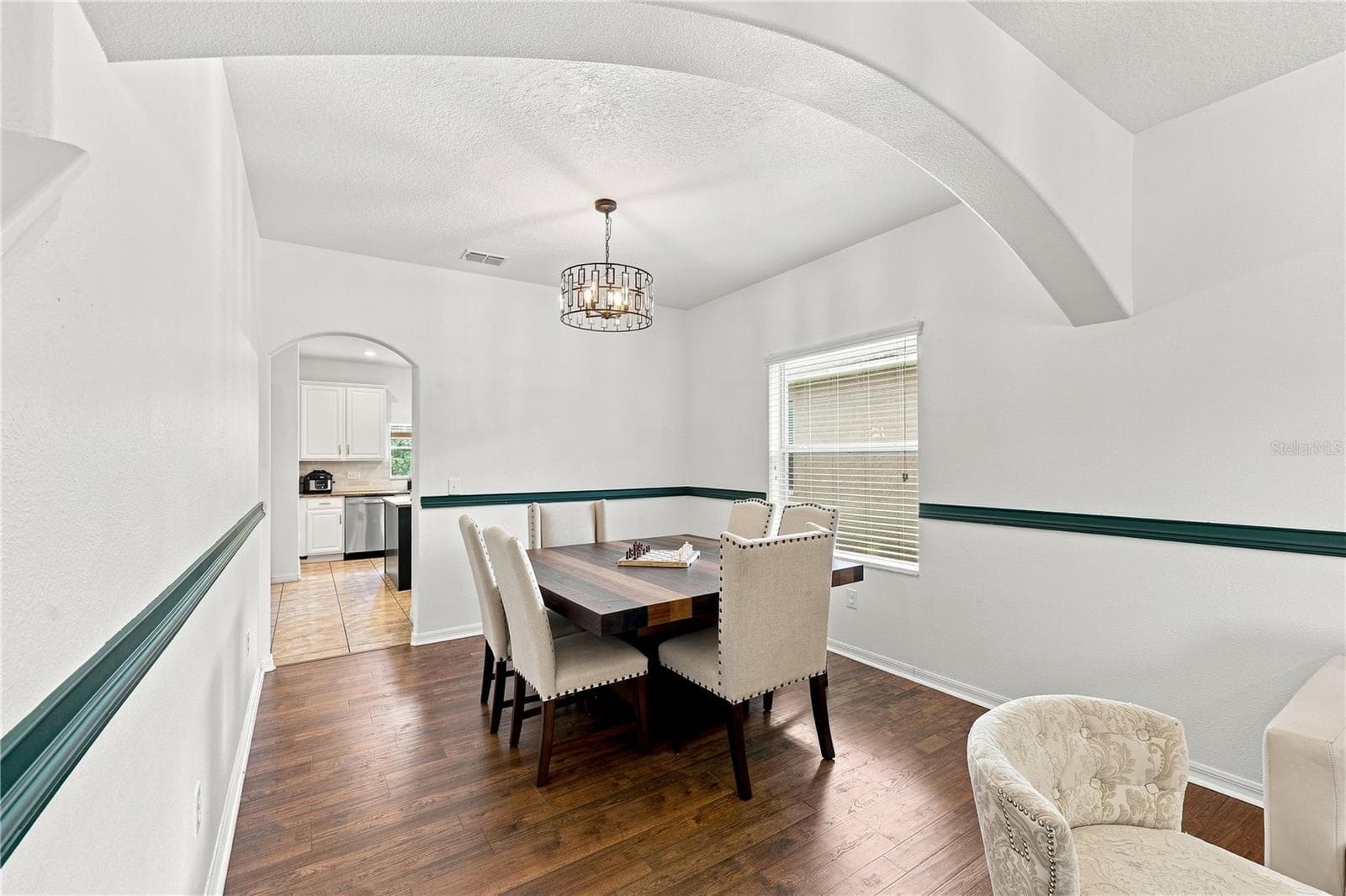 Separate dining room space, 1 of 2! - 16613 MYRTLE SAND DR, WIMAUMA