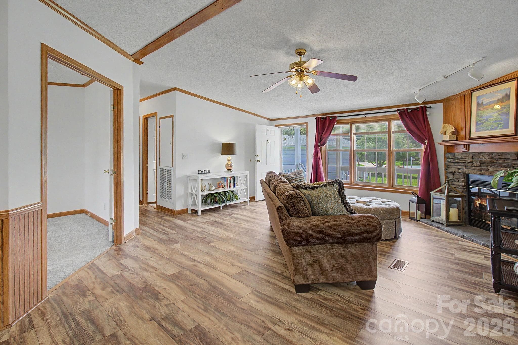 Living area has vaulted ceilings and natural light - 204 Red Birch Court, Hendersonville