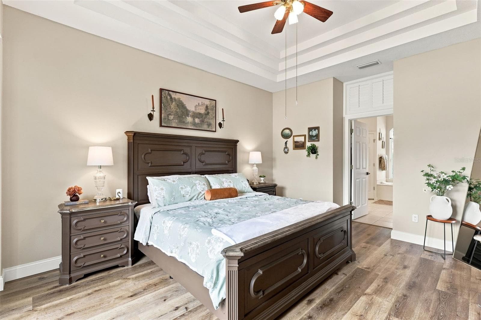 Primary bedroom suite towards walk-in closets and ensuite bath. - 96 PARKVIEW DR, PALM COAST