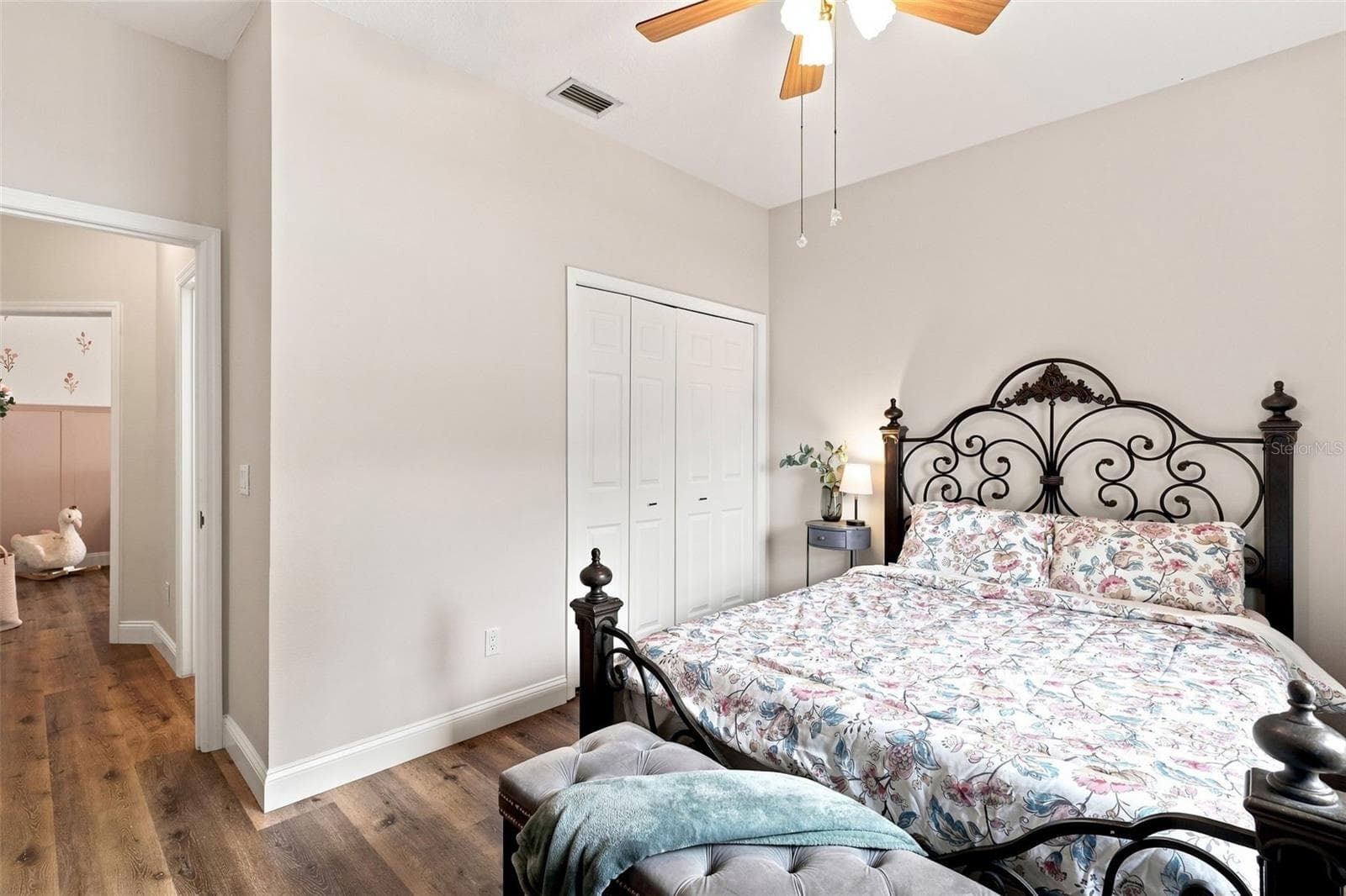 Third bedroom with built-in closet towards entrance/bedroom #2. - 96 PARKVIEW DR, PALM COAST