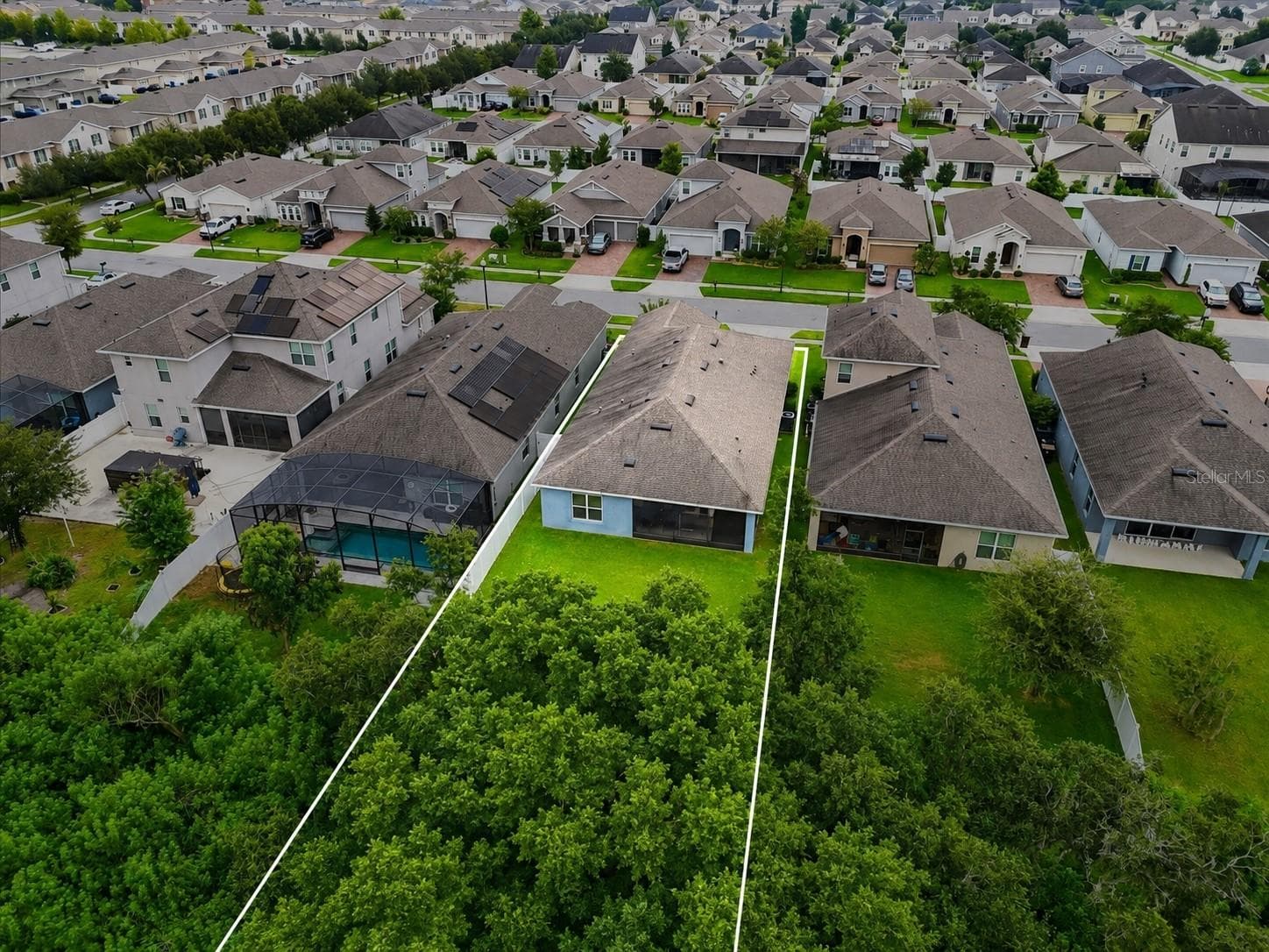 Enjoy the best of both worlds with a welcoming neighborhood setting and a backyard framed by lush natural greenery, creating a peaceful sense of privacy right at home. - 4791 RIVERWALK DR, ST CLOUD