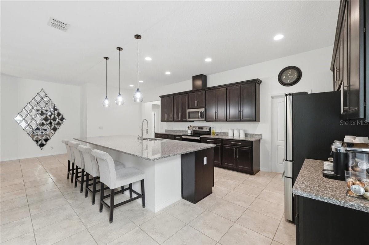 Expansive culinary space brings scale, style and effortless entertaining together beautifully. - 4791 RIVERWALK DR, ST CLOUD