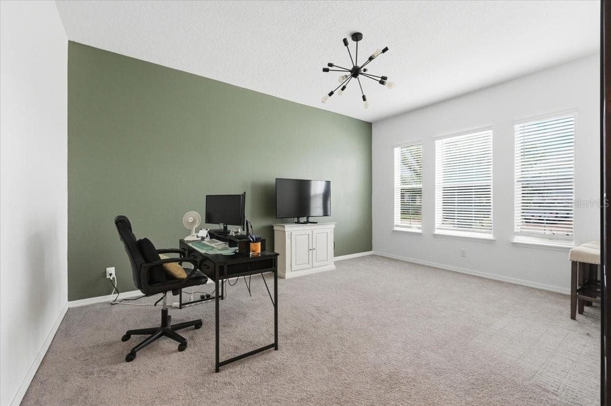 A beautifully scaled flex space with abundant natural light offers the freedom to create your 4th bedroom, executive office or space entirely your own. - 4791 RIVERWALK DR, ST CLOUD