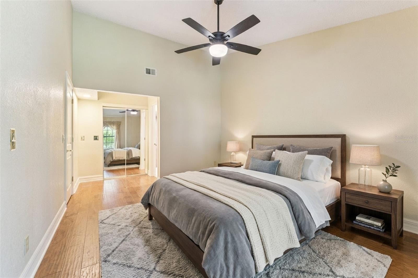 Virtually staged. Primary bedroom. - 2362 SIERRA LN, MAITLAND