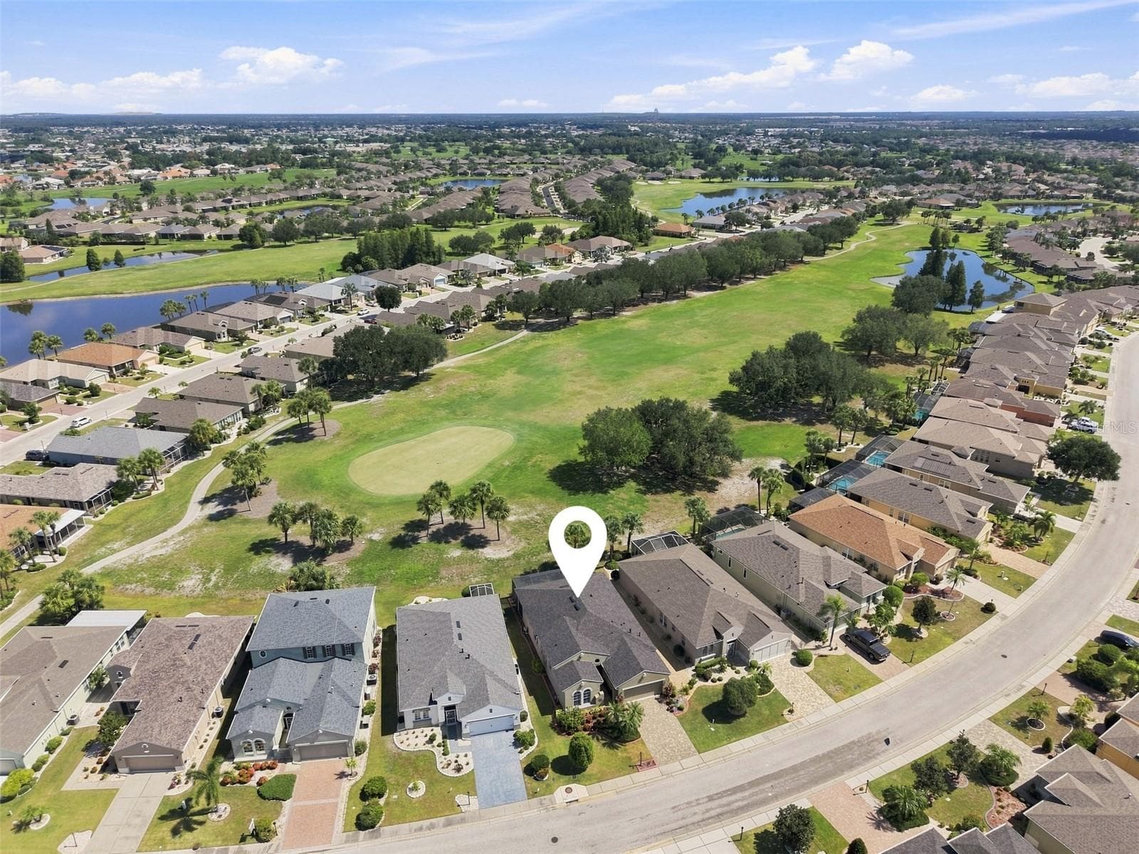 AERI.AL LOCATION SHOWING VIEW OF THE GOLF COURSE AND GREEN - 441 NOBLE FAIRE DR, SUN CITY CENTER