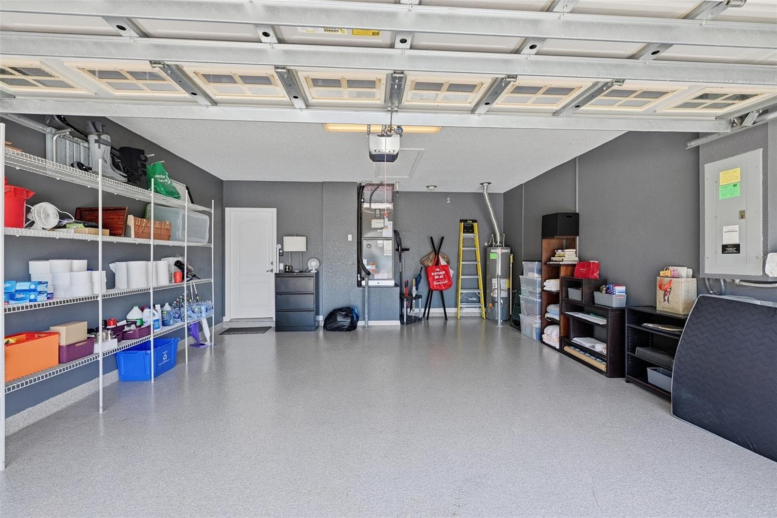 ONE OF THE CLEANEST GARAGES I'VE SEEN.  NEWLY PAINTED AND FLOORING. - 441 NOBLE FAIRE DR, SUN CITY CENTER