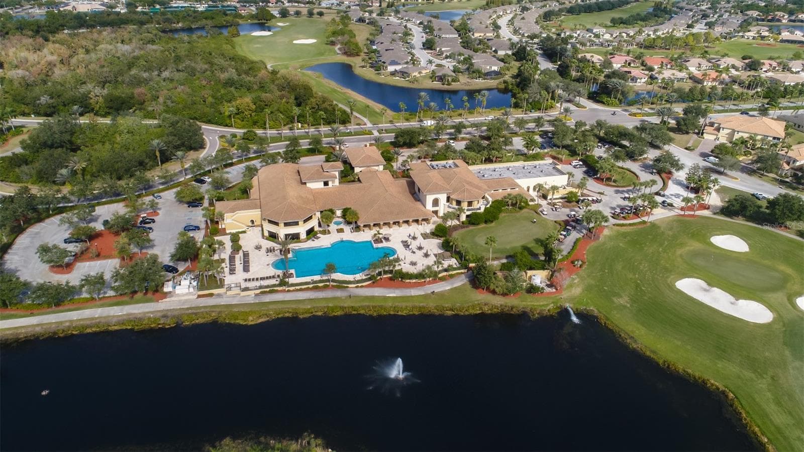 AERIAL OF CLUB RENAISSANCE.  LOOK AT THE POOL, VIIEW AND COMING UP TO THE 9TH HOLE. - 441 NOBLE FAIRE DR, SUN CITY CENTER