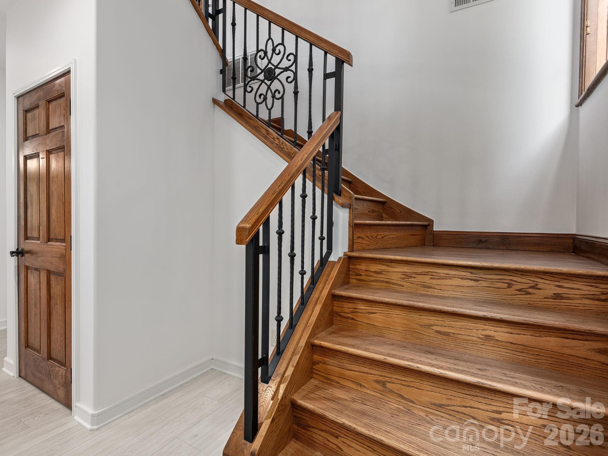 Stair access to upper level. - 248 Wisdom Cove Road, Flat Rock