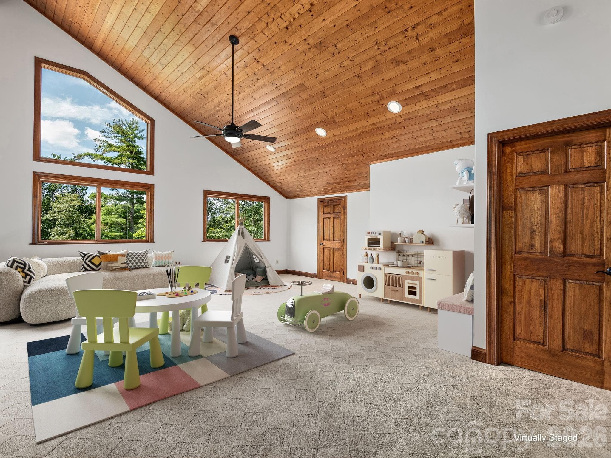 Upper Level Loft area. Far door is interior storage and easy access to upper level hvac. Virtually staged. - 248 Wisdom Cove Road, Flat Rock