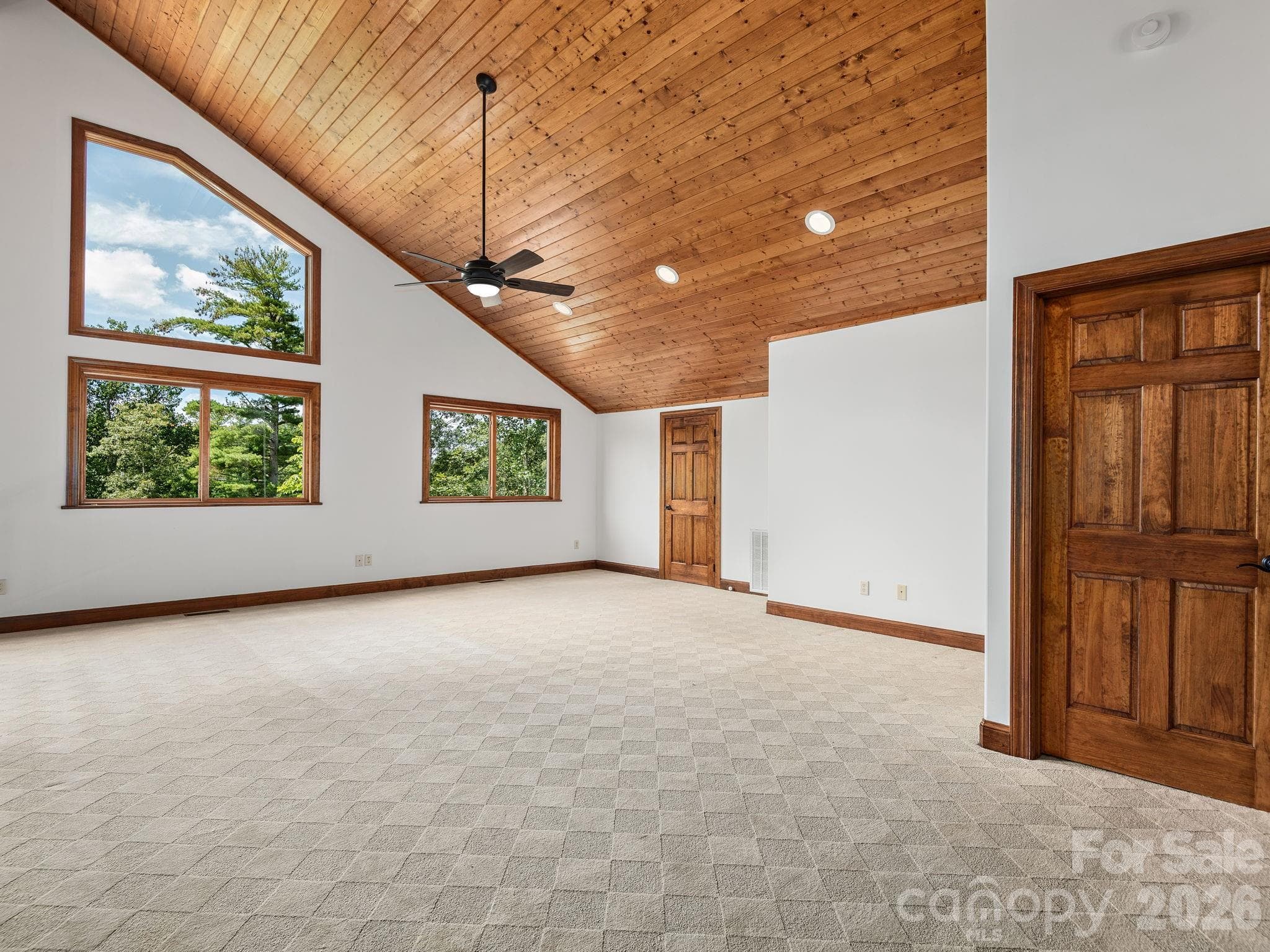 Upper Level Loft area. Door in foreground is to upper level second primary w/attached ensuite. - 248 Wisdom Cove Road, Flat Rock
