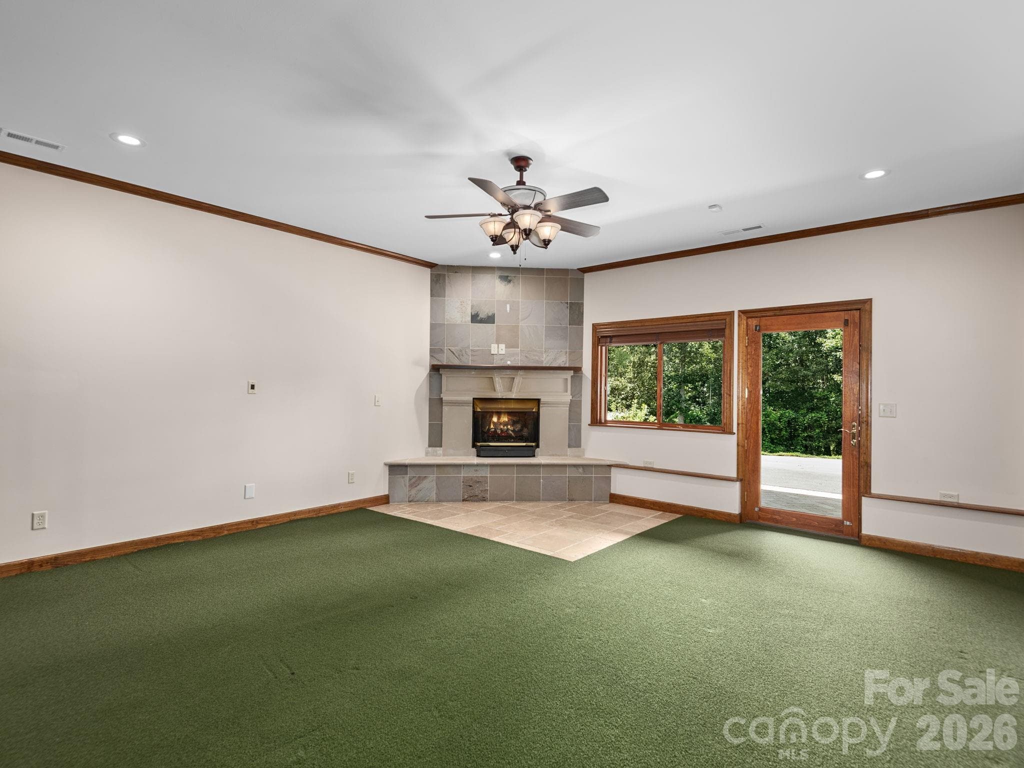 Finished basement living space w/ walk out access at lower level. - 248 Wisdom Cove Road, Flat Rock