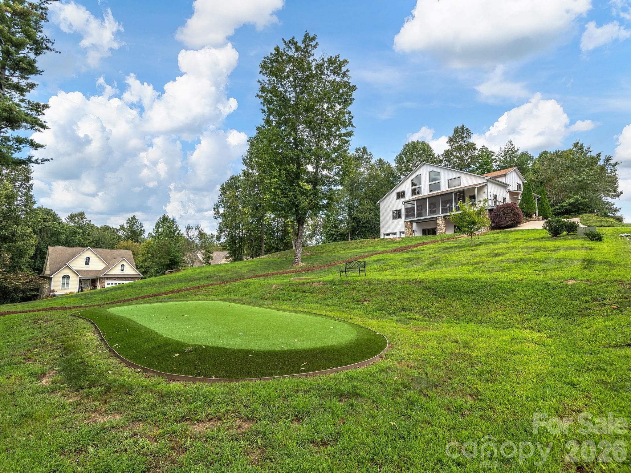 View from installed putting green towards the home. - 248 Wisdom Cove Road, Flat Rock