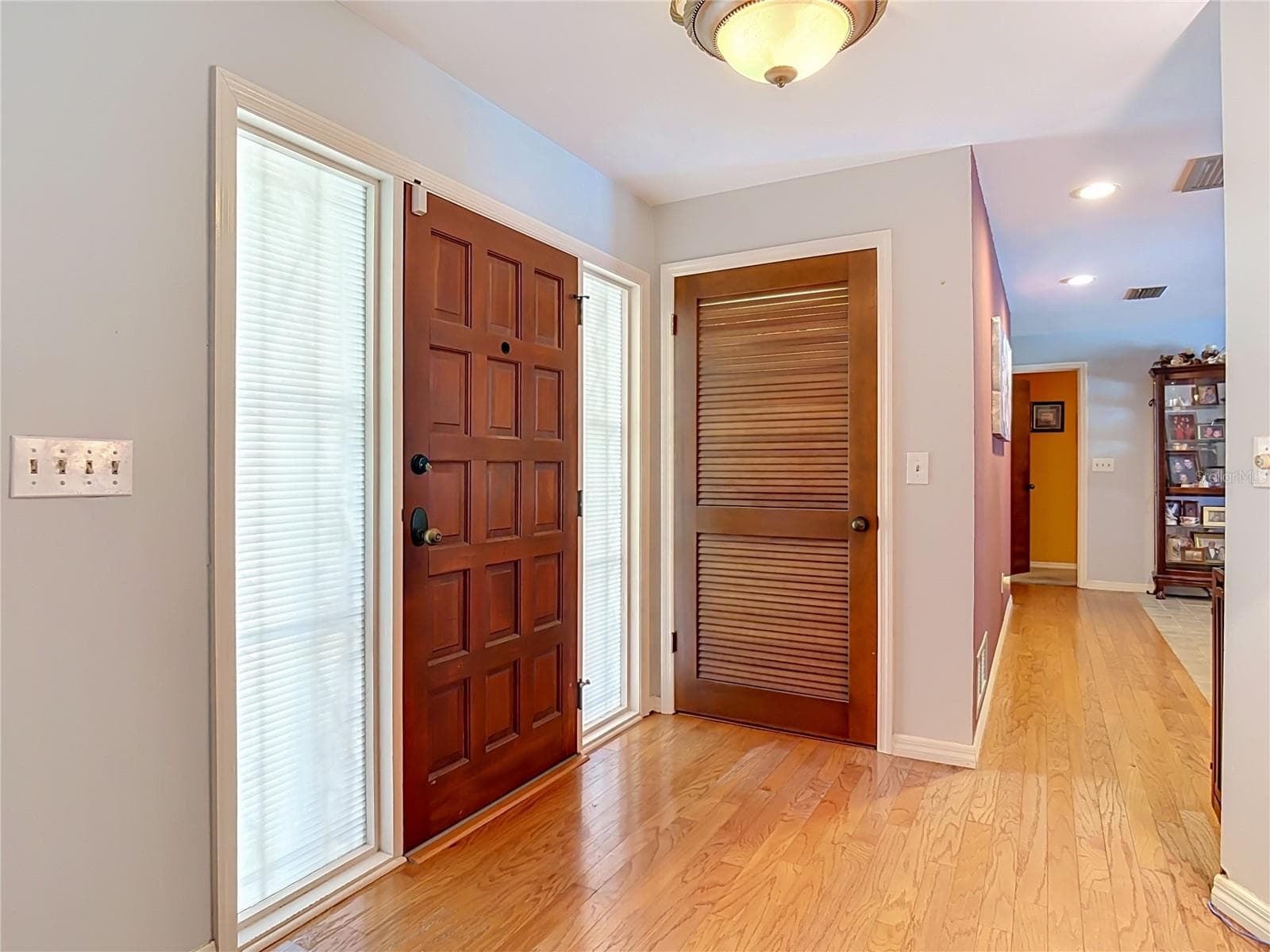 foyer entryway with two large storage closets - 2269 COUNTRY CLUB DR, DELAND