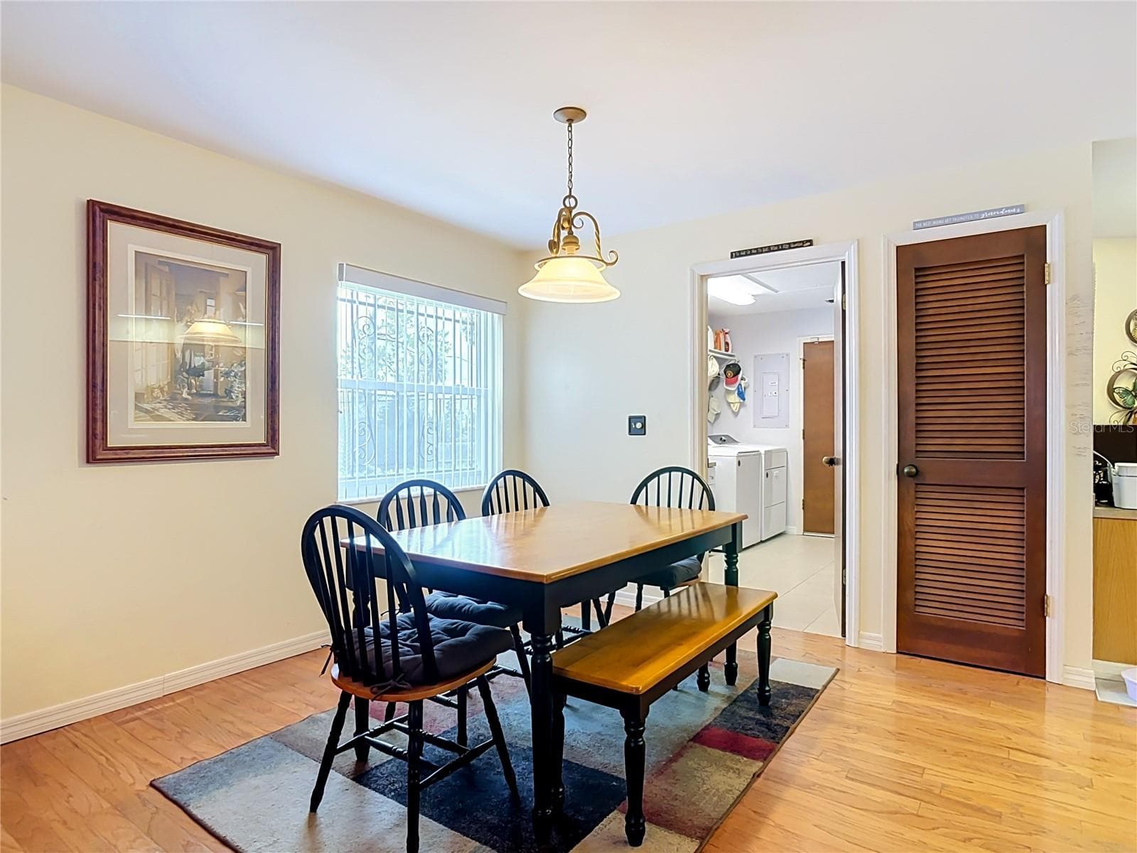 dining room with door to laundry room - 2269 COUNTRY CLUB DR, DELAND