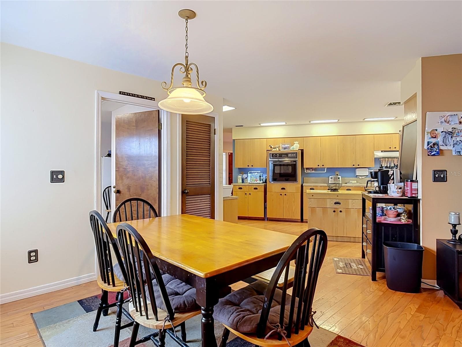 dining open to the kitchen - 2269 COUNTRY CLUB DR, DELAND