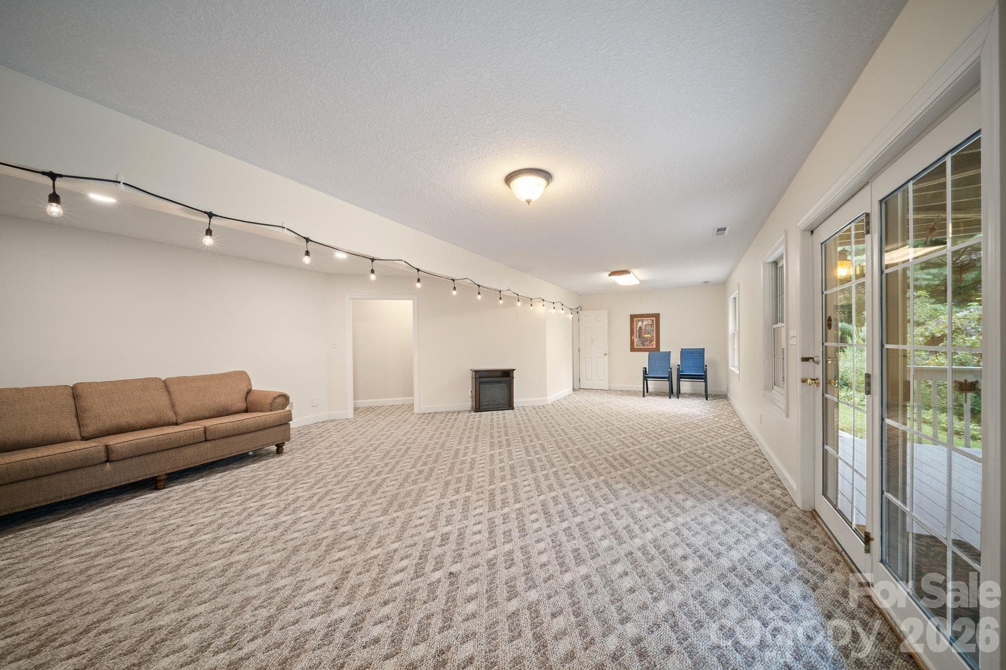 Den/Lower Level. Walk out to backyard - 210 Clear Vista Circle, Asheville