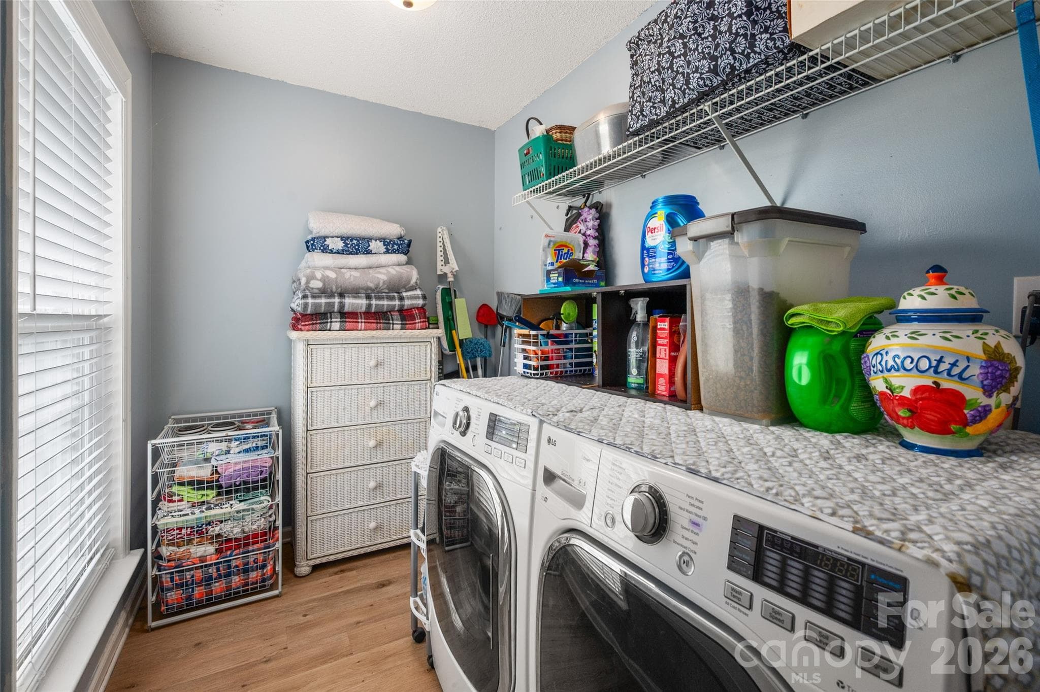 laundry room with stoarage space - 3209 Monte Drive, Monroe