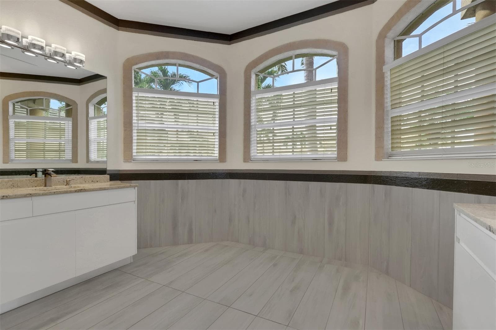 Primary Bathroom with dual vanities - 8596 SOUTHWIND BAY CIR, FORT MYERS