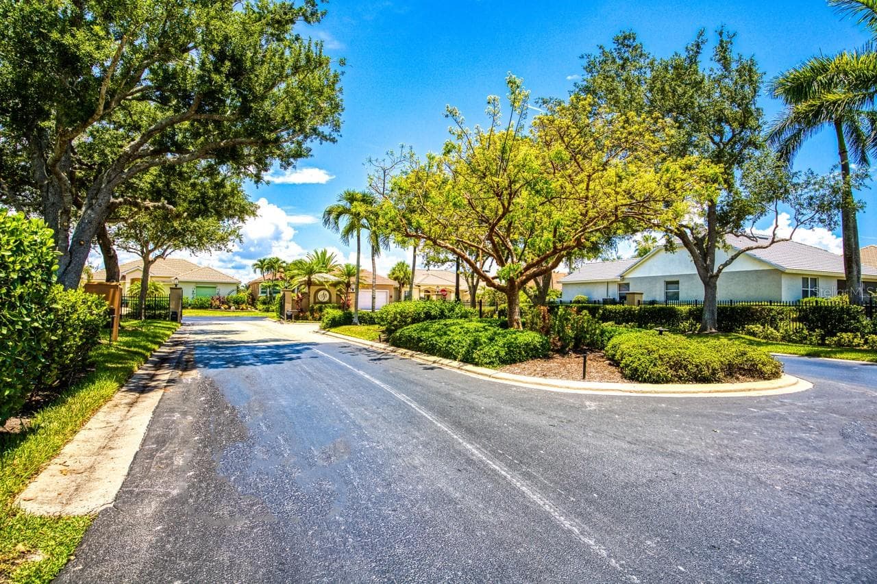 Gated entry with call box - 8596 SOUTHWIND BAY CIR, FORT MYERS