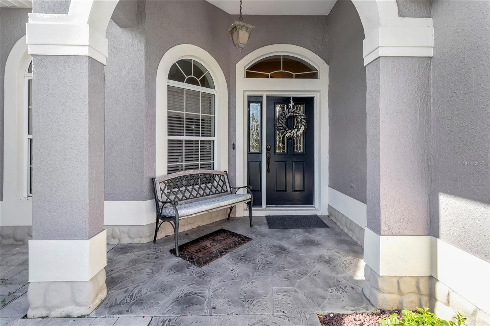 Welcoming private front entrance with paver bricks for added elegance. - 4190 COUNTY ROAD 121D, WILDWOOD