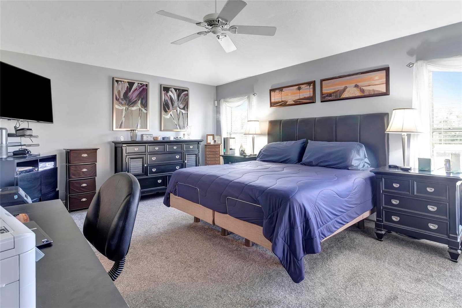 Primary suite with new installed and stretched carpeting. plenty of natural light and separate floor plan design. - 4190 COUNTY ROAD 121D, WILDWOOD