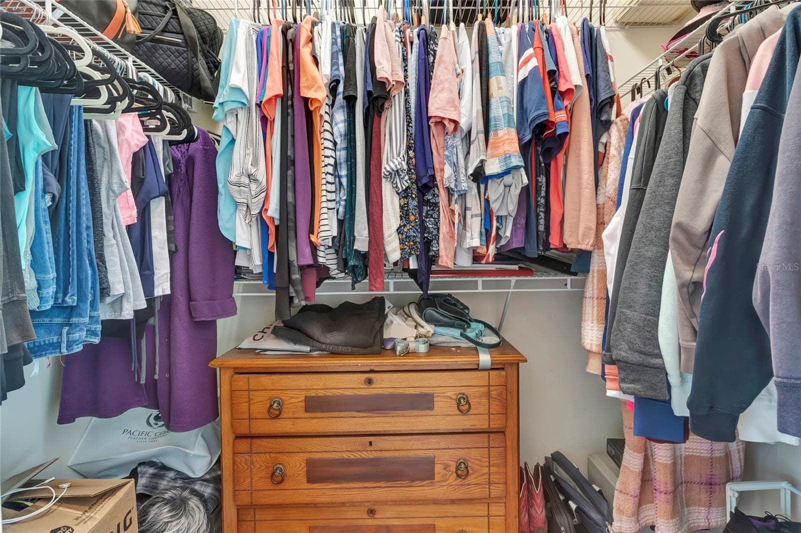 Large walk-in closet with plenty of storage capability. - 4190 COUNTY ROAD 121D, WILDWOOD