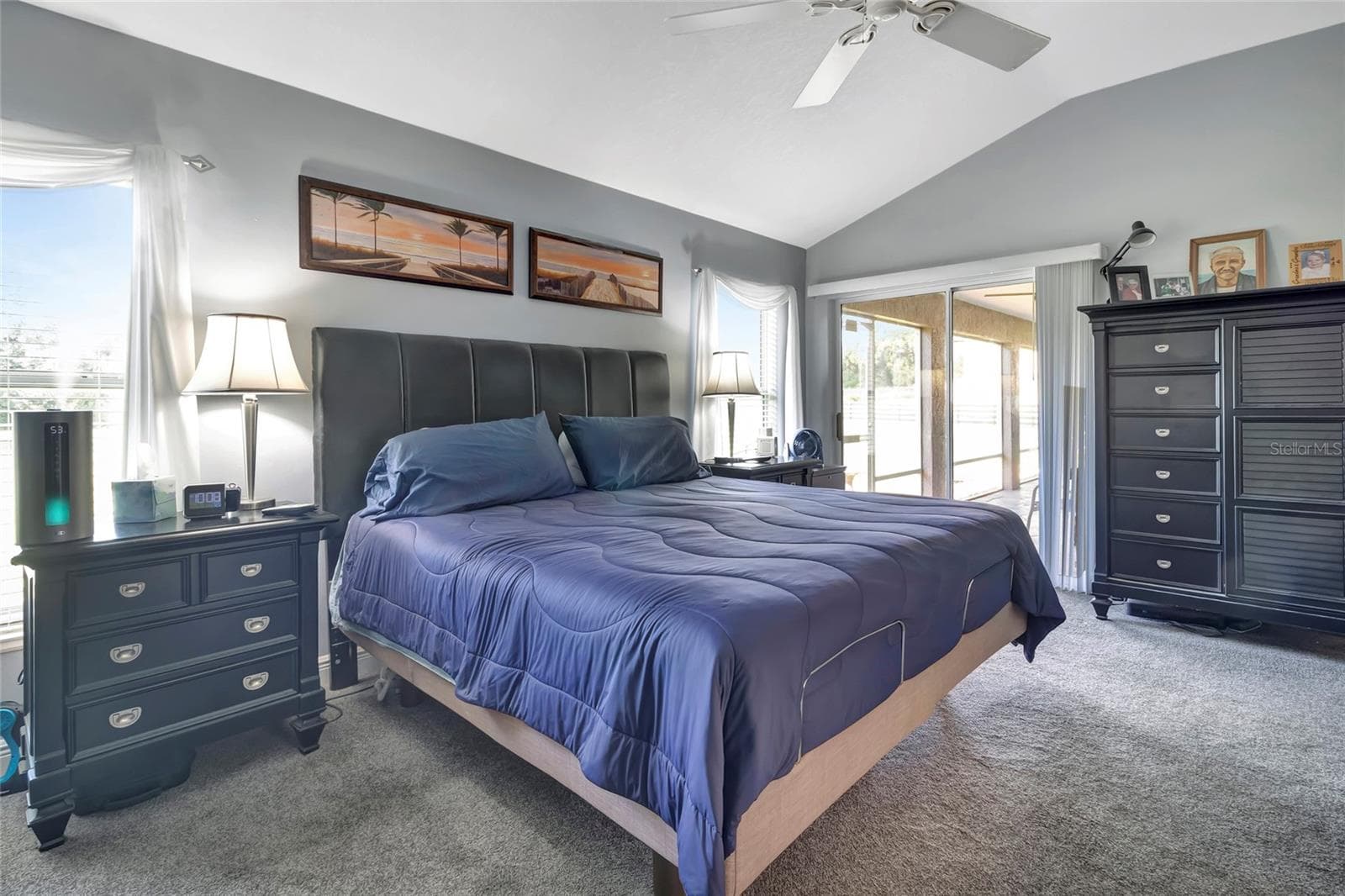 Primary bedroom has its own entrance to the back lanai. - 4190 COUNTY ROAD 121D, WILDWOOD