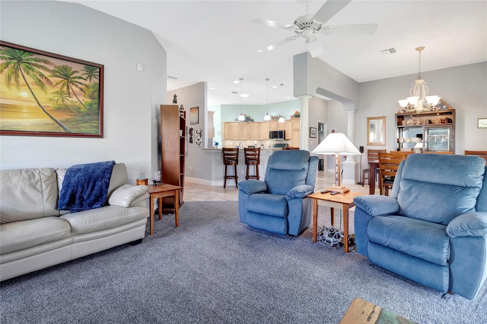 Large open floor plan with the dining area and the kitchen, great for game day!! - 4190 COUNTY ROAD 121D, WILDWOOD