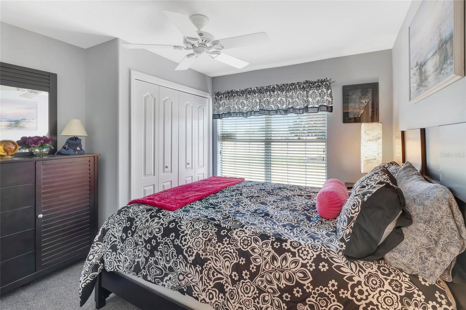 Front guest bedroom with built in closet. - 4190 COUNTY ROAD 121D, WILDWOOD