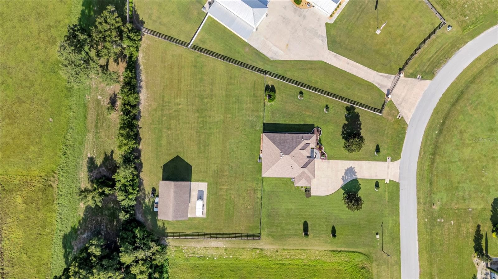 Huge backyard with plenty of privacy with mature growth between your estate and the back neighbor. - 4190 COUNTY ROAD 121D, WILDWOOD